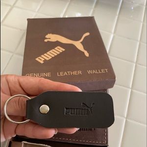 A Brown , puma men wallet,and key chain new with box.